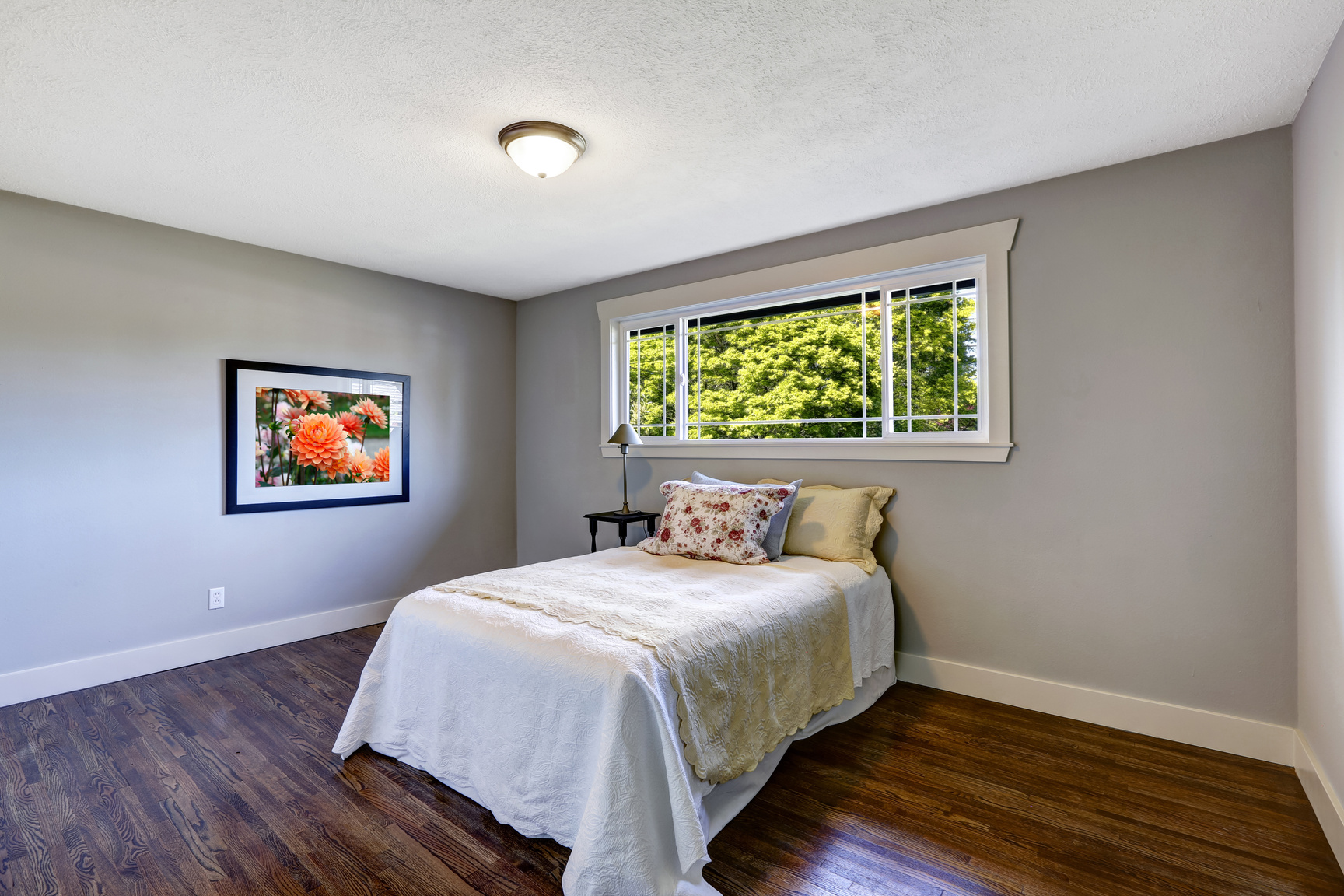 Bedroom interior with single bed and window